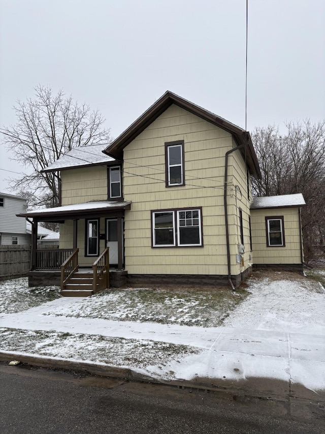 view of property with covered porch