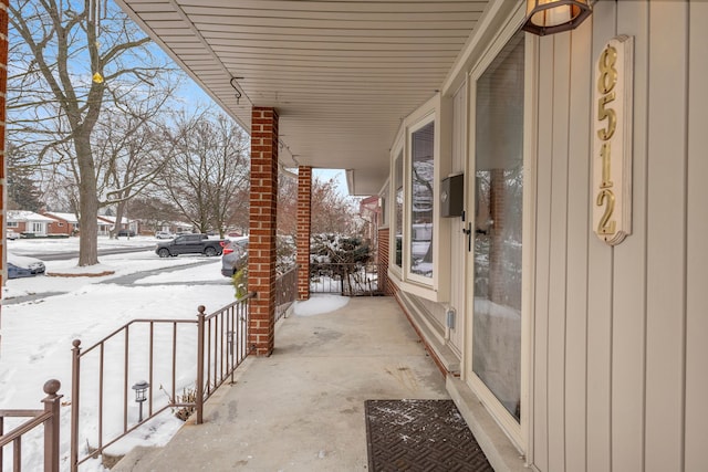 view of snow covered patio