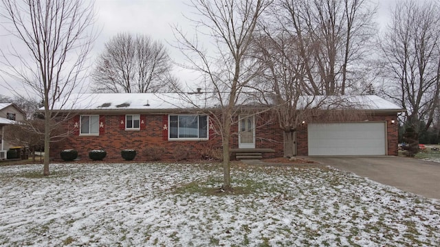 single story home featuring a garage