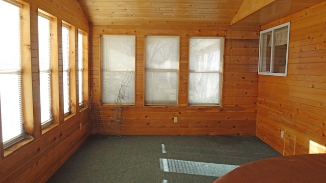 unfurnished sunroom with lofted ceiling