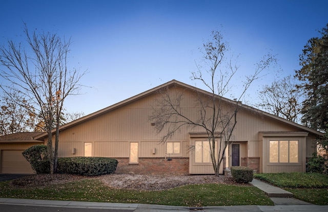 view of front of property with a garage