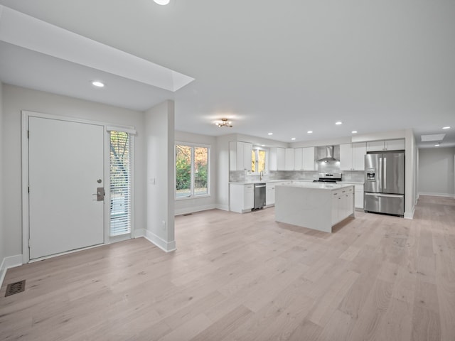 entryway with light wood-type flooring