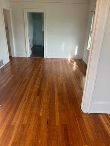 interior space with dark hardwood / wood-style flooring