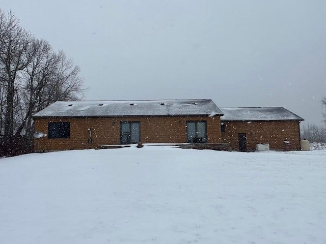 view of snow covered property