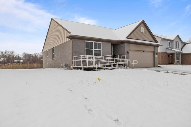 ranch-style home featuring a garage