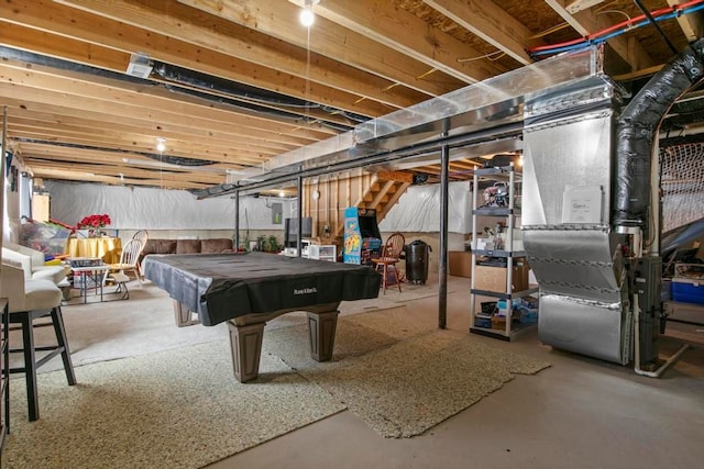 recreation room featuring concrete flooring, billiards, and heating unit