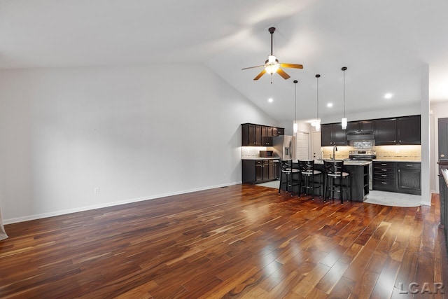 living room featuring ceiling fan, sink, high vaulted ceiling, and dark hardwood / wood-style floors