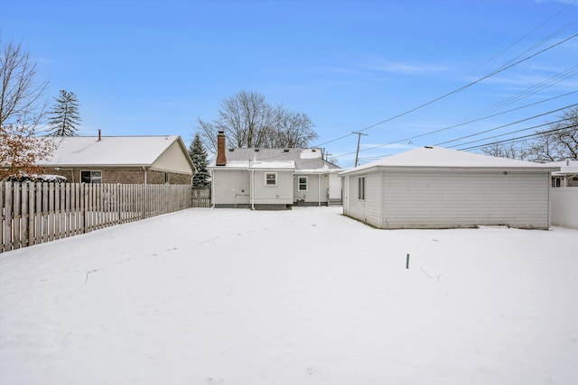 view of snow covered house