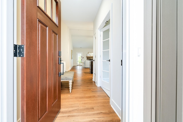 hall featuring light hardwood / wood-style floors