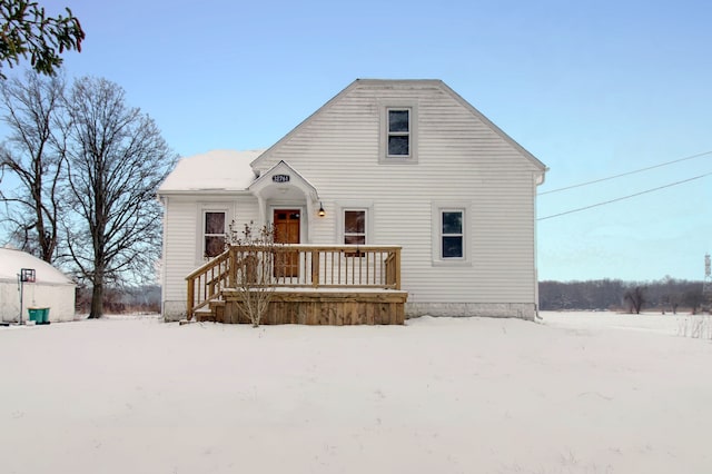 view of snow covered house