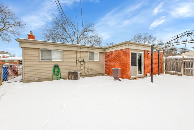 view of snow covered house