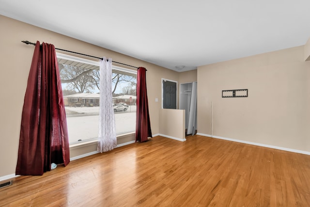 empty room with light wood-type flooring