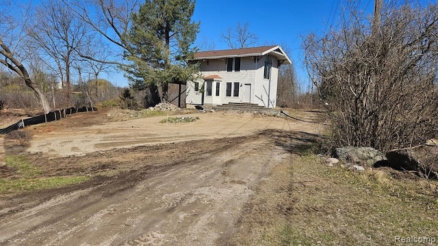 4433 Brighton Rd, Howell, MI 48843 - view of front of property with driveway
