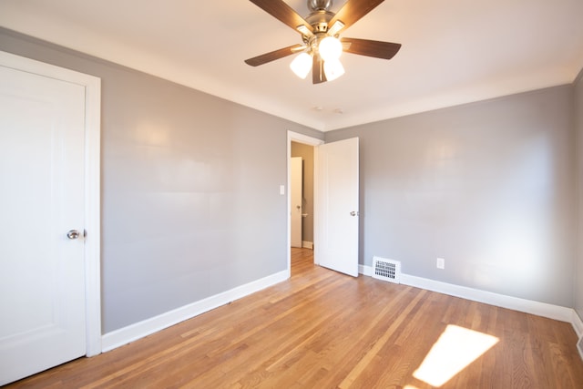 unfurnished bedroom featuring light hardwood / wood-style floors and ceiling fan