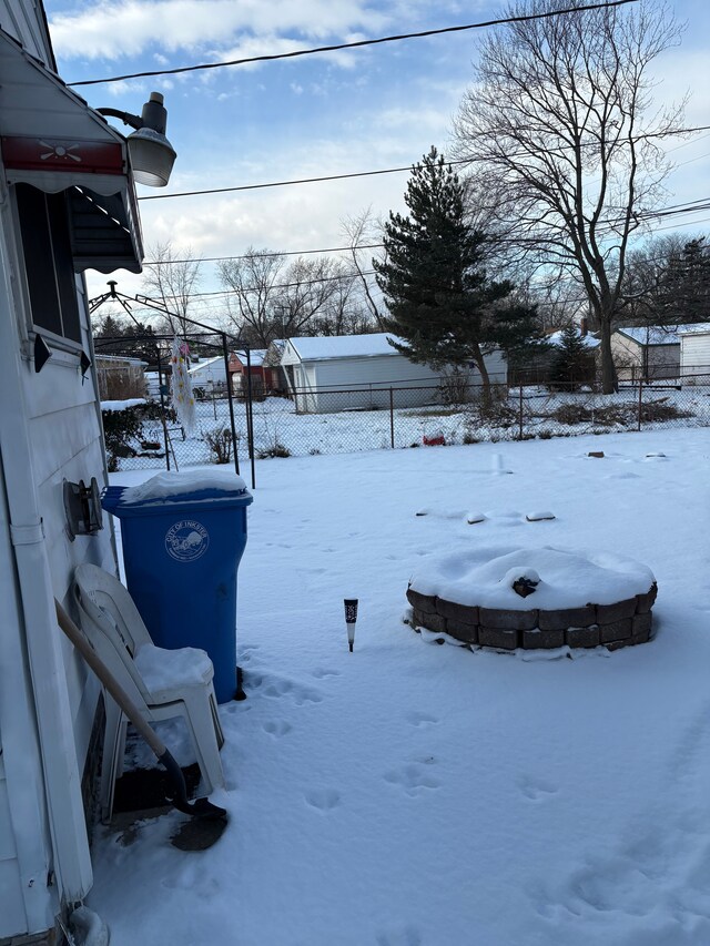 view of yard covered in snow