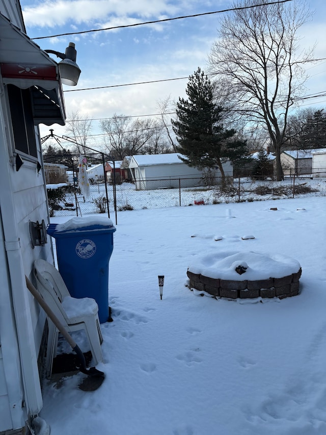 view of yard covered in snow