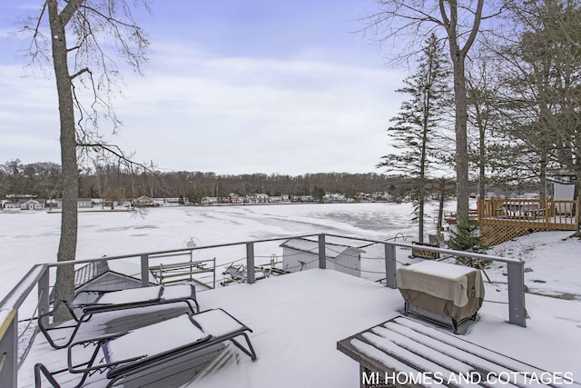 view of snow covered deck