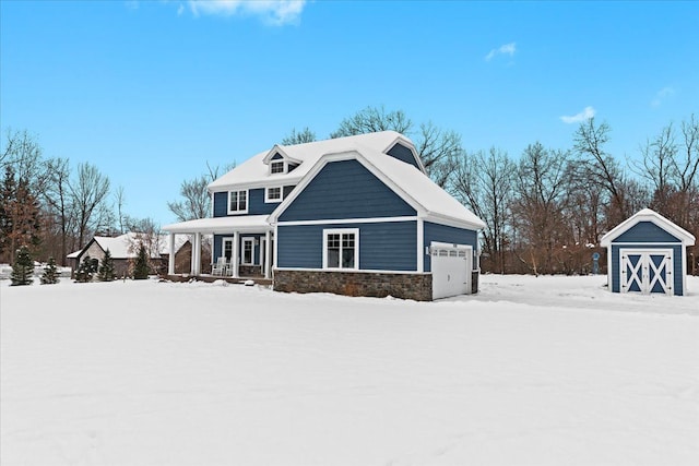 view of front facade with a garage and a porch