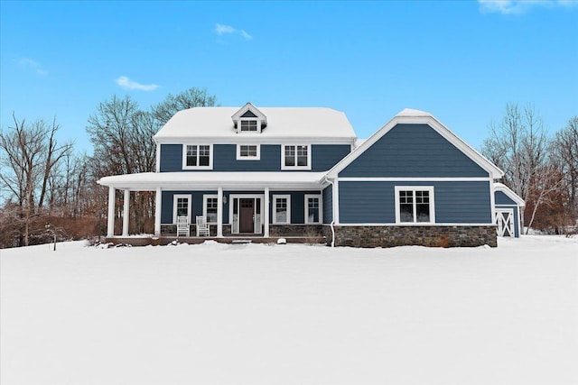 view of front of property featuring covered porch