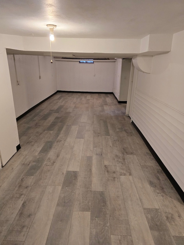 corridor featuring hardwood / wood-style flooring