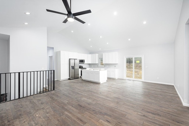 unfurnished living room featuring high vaulted ceiling, wood-type flooring, and ceiling fan