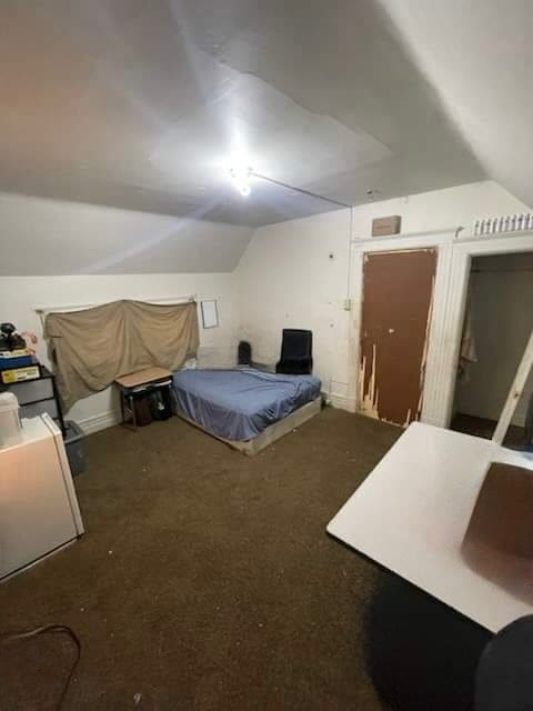 bedroom featuring vaulted ceiling and billiards