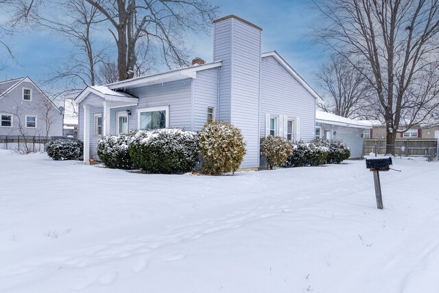 view of snow covered property