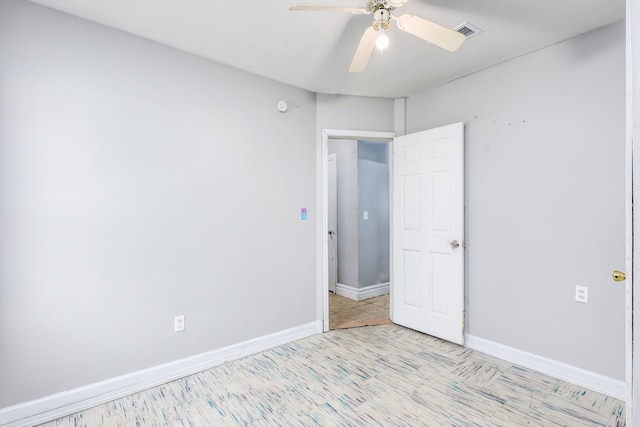 unfurnished bedroom featuring ceiling fan