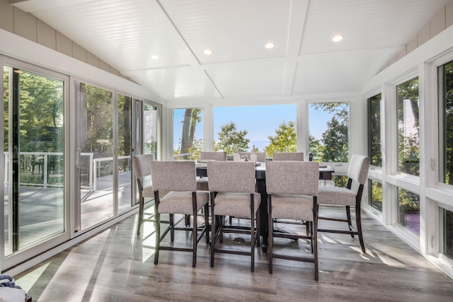 sunroom / solarium with wooden ceiling and vaulted ceiling with beams