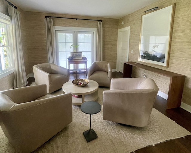 sitting room featuring dark wood-type flooring