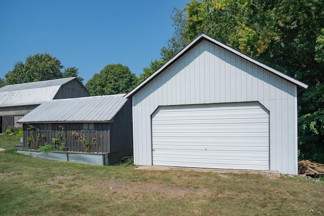 garage with a yard