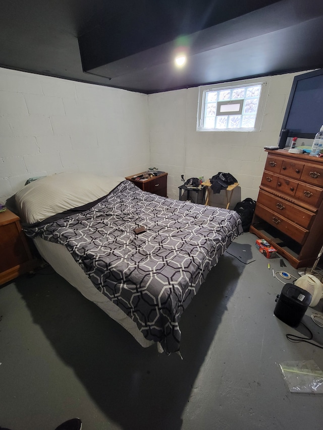 bedroom with concrete flooring