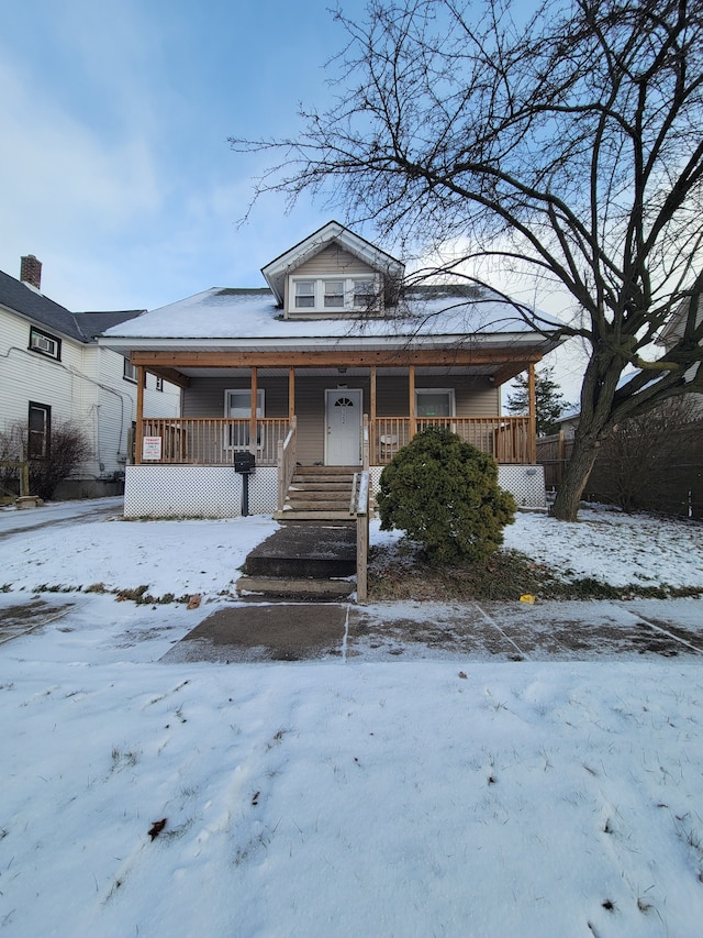 bungalow-style home with a porch