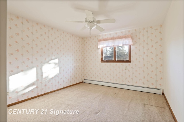 carpeted spare room featuring ceiling fan and a baseboard radiator