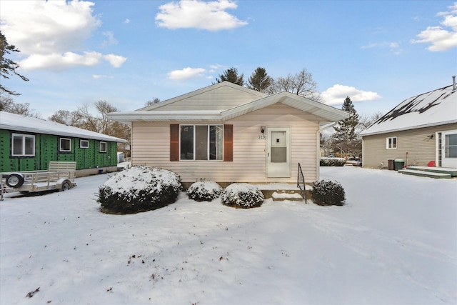 bungalow with central AC unit