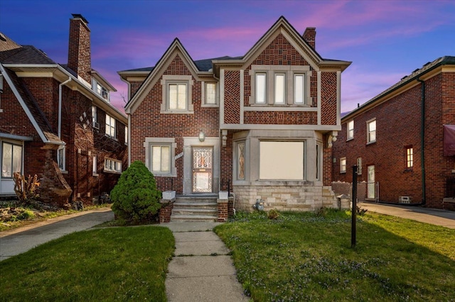 17390 Northlawn St, Detroit, MI 48221 - townhome / multi-family property with a lawn, a chimney, and brick siding