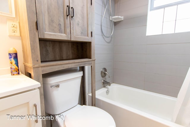 full bathroom featuring shower / bathtub combination with curtain, vanity, and toilet