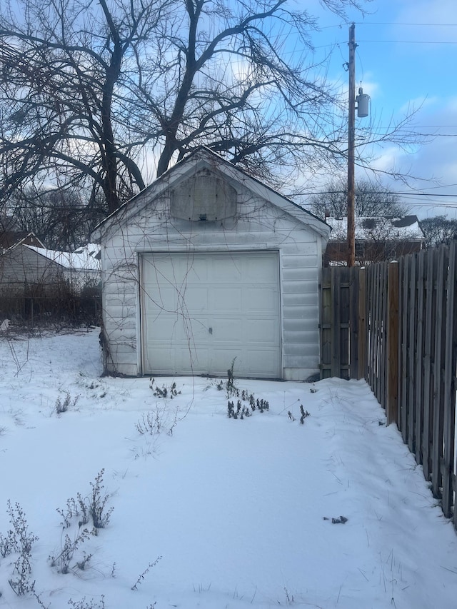 view of snow covered garage