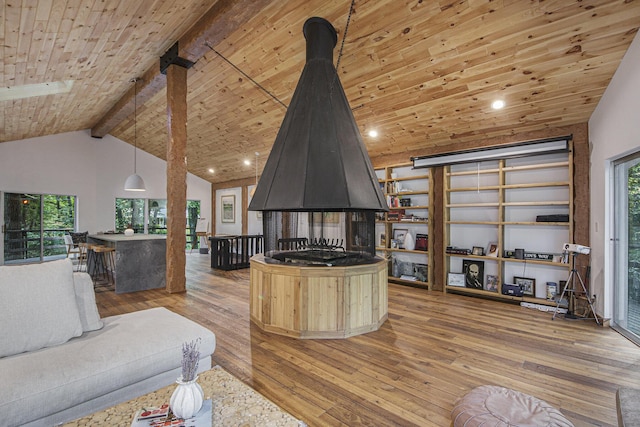 living room featuring hardwood / wood-style flooring, beam ceiling, wood ceiling, and high vaulted ceiling