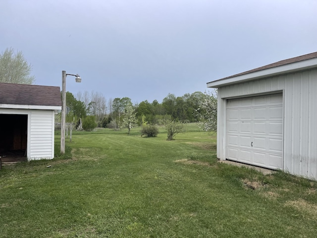8142 W 32nd Rd, Harrietta, MI 49638 - view of grassy yard featuring an outdoor structure