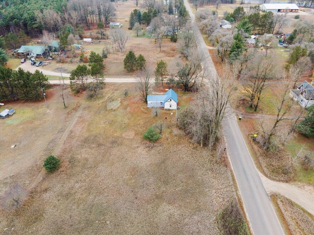 birds eye view of property featuring a rural view