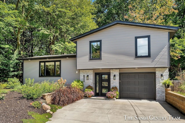 split level home with a garage