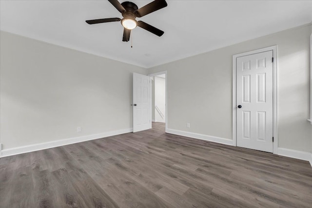 unfurnished room featuring ceiling fan and hardwood / wood-style floors