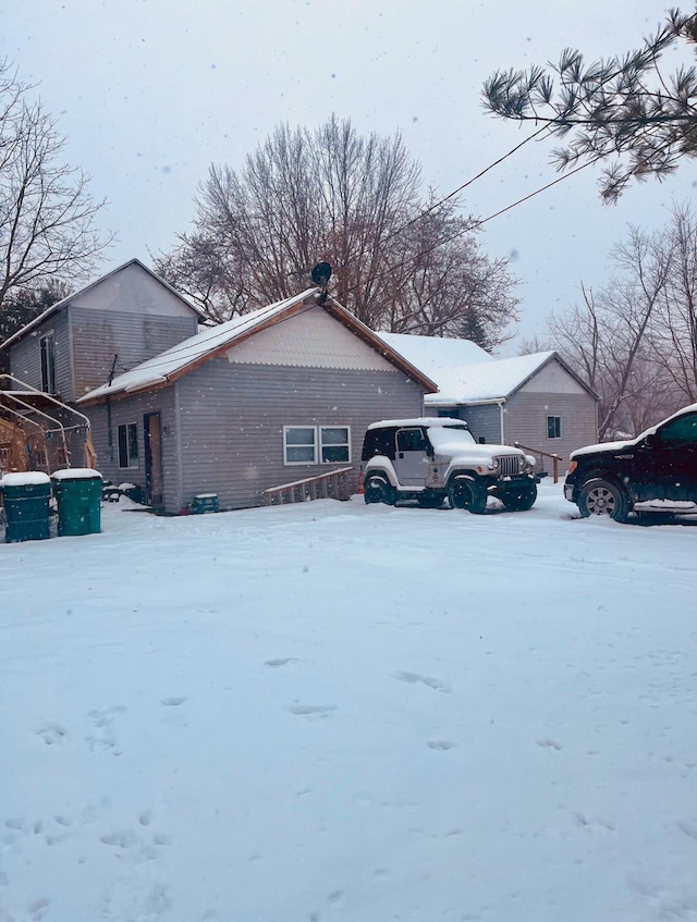 view of snow covered property