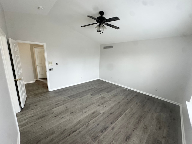 unfurnished room with dark hardwood / wood-style floors, ceiling fan, and lofted ceiling