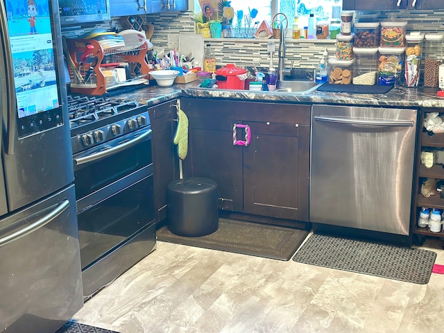 kitchen with sink and appliances with stainless steel finishes