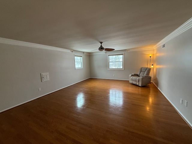 unfurnished room with hardwood / wood-style floors, ceiling fan, and ornamental molding