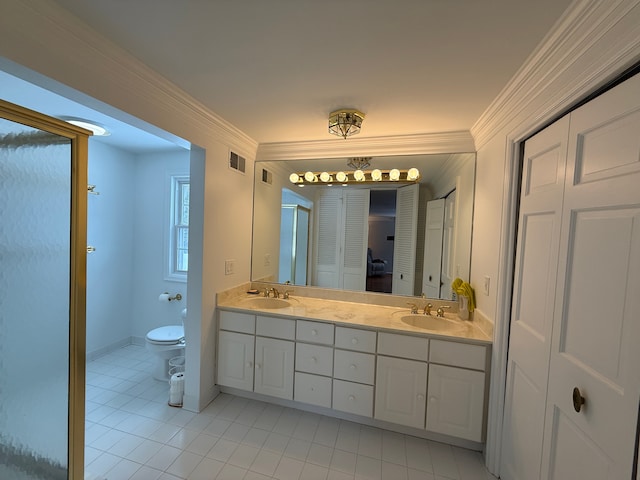 bathroom with tile patterned floors, walk in shower, vanity, crown molding, and toilet