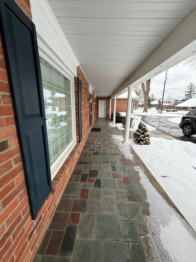 view of snow covered patio