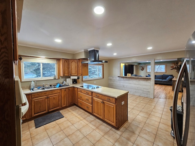 kitchen featuring ventilation hood, crown molding, sink, black electric cooktop, and kitchen peninsula